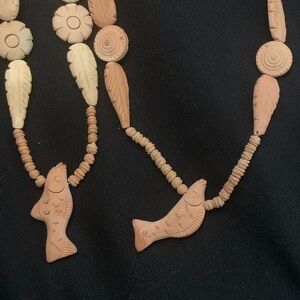 Carved Ceramic Fish Pendants & Beads. Two Necklaces in Peach and Cream